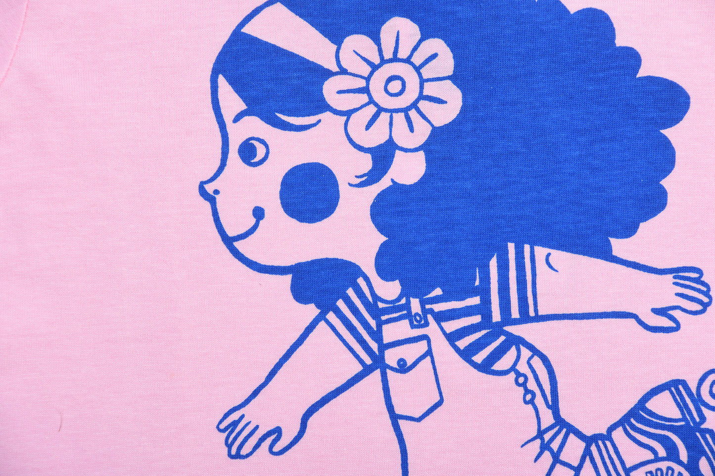 Cartoon character with blue hair and flower on pink background