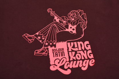 burgundy red sweater with a graphic pink print of King Kong.