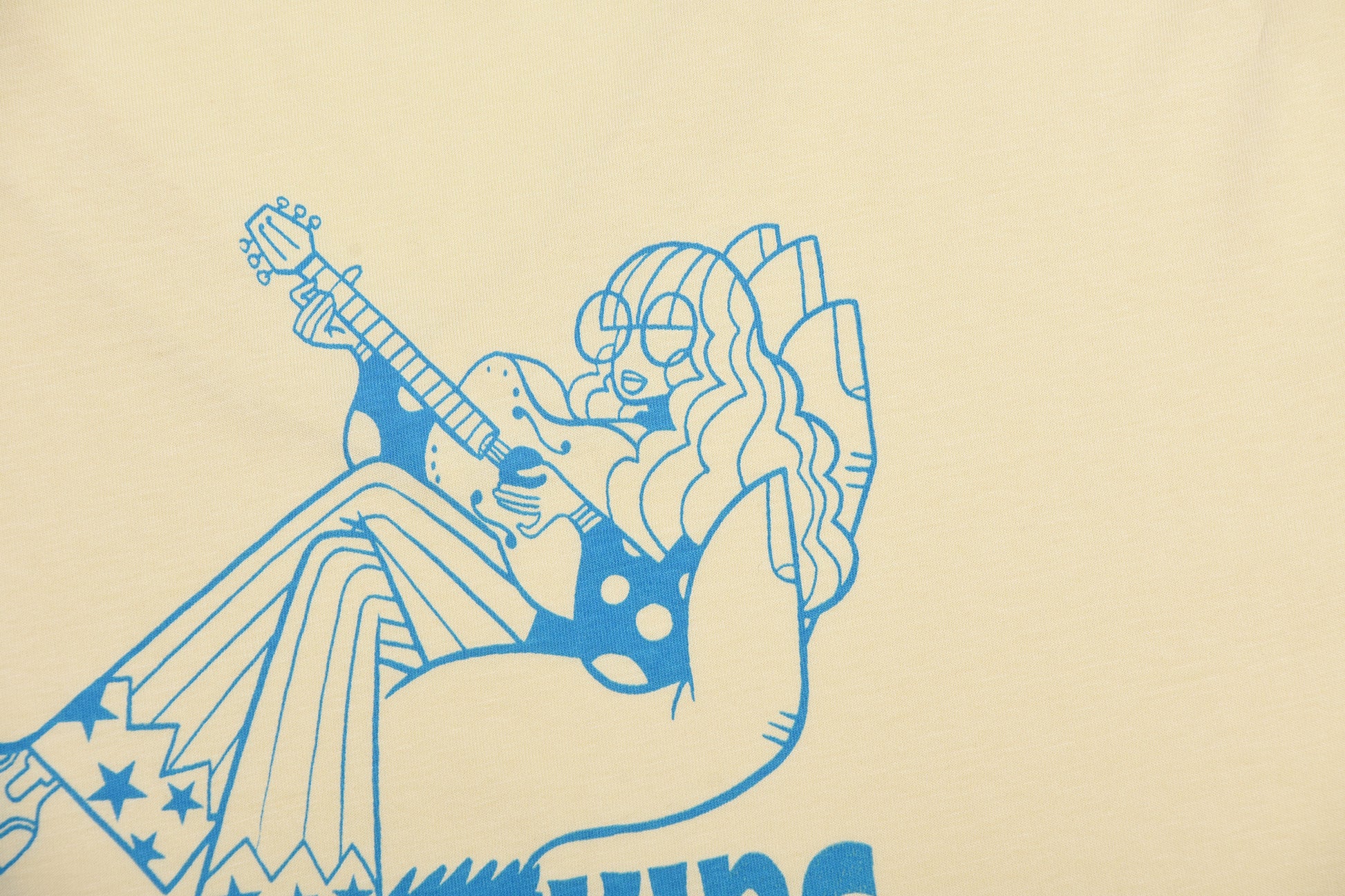 Blue line art of a person playing guitar on a beige background