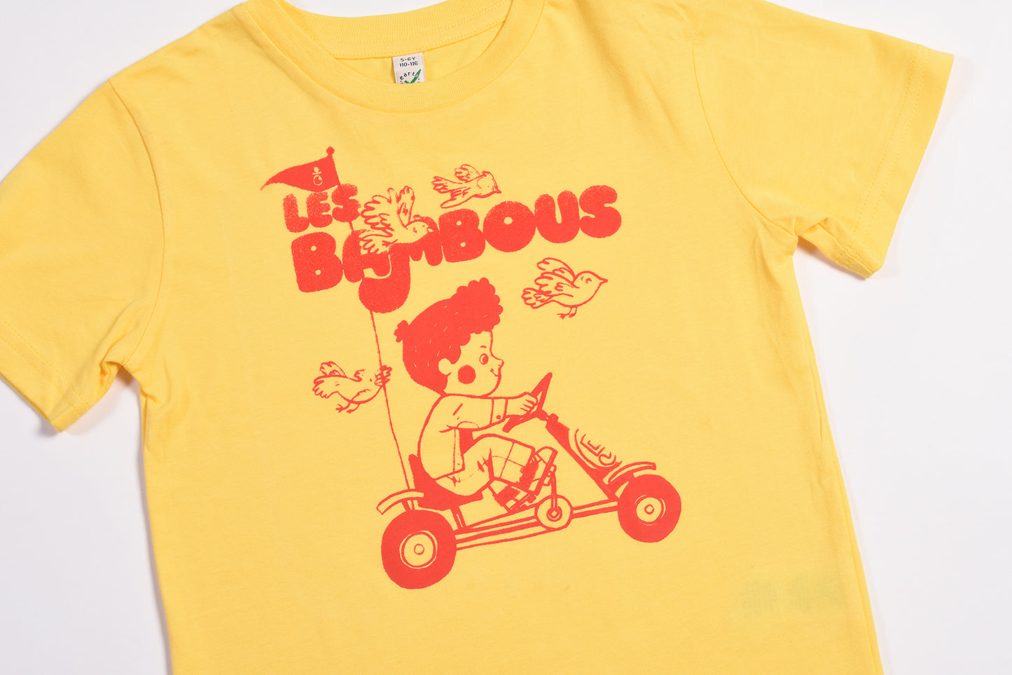 Yellow t-shirt with red graphic design on a white background